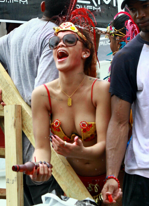 Rihanna returns to her hometown to take part in a Kadooment Day parade which was held in Barbados on August 1, 2011

Rihanna: Super Sexy for Kadooment Day Parade!

Rihanna wears a barely there bikini for a Kadooment Day parade held on Monday (August 1) in Barbados.

The 23-year-old singer arrived back in her hometown over the weekend after wrapping up the North American leg of her Loud tour.

FYI: Kadooment Day is the final day of the Crop Over traditional festival, which historically celebrated the end of the sugar cane harvest. Thousands of Barbadians join different bands with members dressed in elaborate costumes!