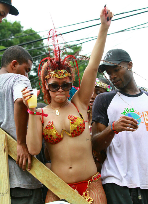 Rihanna returns to her hometown to take part in a Kadooment Day parade which was held in Barbados on August 1, 2011

Rihanna: Super Sexy for Kadooment Day Parade!

Rihanna wears a barely there bikini for a Kadooment Day parade held on Monday (August 1) in Barbados.

The 23-year-old singer arrived back in her hometown over the weekend after wrapping up the North American leg of her Loud tour.

FYI: Kadooment Day is the final day of the Crop Over traditional festival, which historically celebrated the end of the sugar cane harvest. Thousands of Barbadians join different bands with members dressed in elaborate costumes!