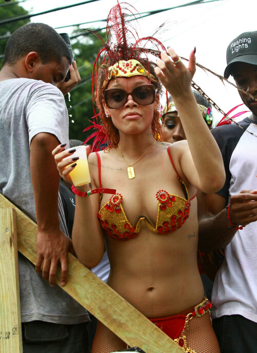 Rihanna returns to her hometown to take part in a Kadooment Day parade which was held in Barbados on August 1, 2011

Rihanna: Super Sexy for Kadooment Day Parade!

Rihanna wears a barely there bikini for a Kadooment Day parade held on Monday (August 1) in Barbados.

The 23-year-old singer arrived back in her hometown over the weekend after wrapping up the North American leg of her Loud tour.

FYI: Kadooment Day is the final day of the Crop Over traditional festival, which historically celebrated the end of the sugar cane harvest. Thousands of Barbadians join different bands with members dressed in elaborate costumes!