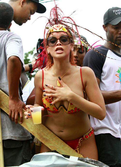 Rihanna returns to her hometown to take part in a Kadooment Day parade which was held in Barbados on August 1, 2011

Rihanna: Super Sexy for Kadooment Day Parade!

Rihanna wears a barely there bikini for a Kadooment Day parade held on Monday (August 1) in Barbados.

The 23-year-old singer arrived back in her hometown over the weekend after wrapping up the North American leg of her Loud tour.

FYI: Kadooment Day is the final day of the Crop Over traditional festival, which historically celebrated the end of the sugar cane harvest. Thousands of Barbadians join different bands with members dressed in elaborate costumes!