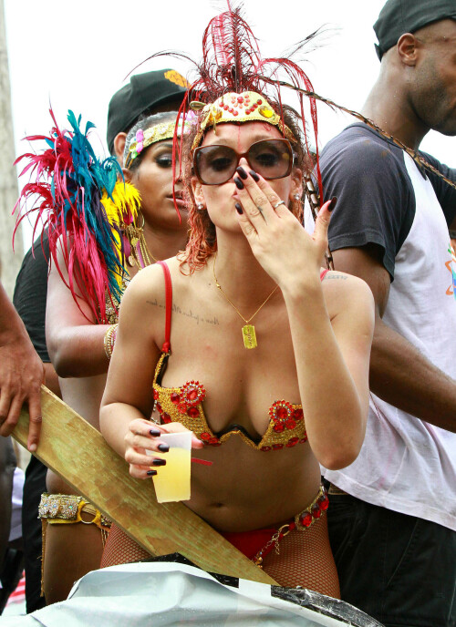 Rihanna returns to her hometown to take part in a Kadooment Day parade which was held in Barbados on August 1, 2011

Rihanna: Super Sexy for Kadooment Day Parade!

Rihanna wears a barely there bikini for a Kadooment Day parade held on Monday (August 1) in Barbados.

The 23-year-old singer arrived back in her hometown over the weekend after wrapping up the North American leg of her Loud tour.

FYI: Kadooment Day is the final day of the Crop Over traditional festival, which historically celebrated the end of the sugar cane harvest. Thousands of Barbadians join different bands with members dressed in elaborate costumes!