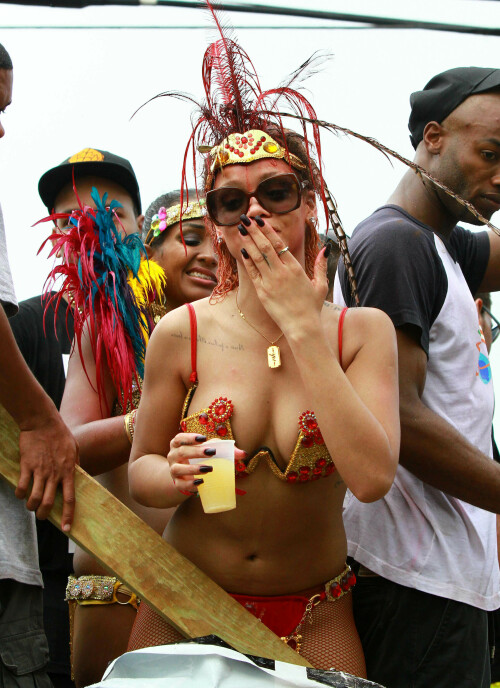 Rihanna returns to her hometown to take part in a Kadooment Day parade which was held in Barbados on August 1, 2011

Rihanna: Super Sexy for Kadooment Day Parade!

Rihanna wears a barely there bikini for a Kadooment Day parade held on Monday (August 1) in Barbados.

The 23-year-old singer arrived back in her hometown over the weekend after wrapping up the North American leg of her Loud tour.

FYI: Kadooment Day is the final day of the Crop Over traditional festival, which historically celebrated the end of the sugar cane harvest. Thousands of Barbadians join different bands with members dressed in elaborate costumes!