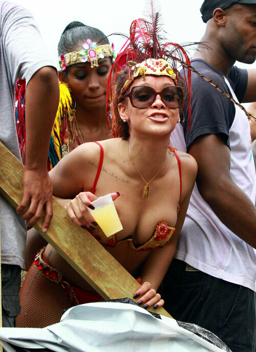 Rihanna returns to her hometown to take part in a Kadooment Day parade which was held in Barbados on August 1, 2011

Rihanna: Super Sexy for Kadooment Day Parade!

Rihanna wears a barely there bikini for a Kadooment Day parade held on Monday (August 1) in Barbados.

The 23-year-old singer arrived back in her hometown over the weekend after wrapping up the North American leg of her Loud tour.

FYI: Kadooment Day is the final day of the Crop Over traditional festival, which historically celebrated the end of the sugar cane harvest. Thousands of Barbadians join different bands with members dressed in elaborate costumes!