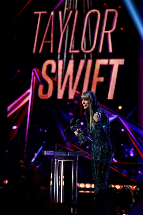 Taylor Swift - 2023 iHeartRadio Music Awards at Dolby Theatre in Hollywood - March 27, 2023

Taylor Swift sports sparkling jumpsuit at iHeartRadio Music Awards 2023

She’s in her innovator era.

Taylor Swift took a break from her Eras Tour to attend Monday night’s iHeartRadio Music Awards 2023, where she’s set to be honored with the Innovator Award during the ceremony.

And while she skipped the red carpet, the pop superstar popped up inside the ceremony, clad in a crystal-covered hooded jacket, pants and boots from Alexandre Vauthier Couture that lent the look of a jumpsuit (and could’ve been plucked straight from her “Reputation” era).

Swift wore her hair sleek and straight, completing her futuristic fashion moment with a silvery smoky eye, glossy nude lip and iridescent manicure, along with jewelry from KatKim and Anita Ko.

Per iHeartRadio’s press release, the Innovator Award is bestowed on an artist who has “impacted global pop culture throughout their career.”

Past recipients include Justin Timberlake, Pharrell Williams, U2, Bruno Mars, Chance the Rapper and Alicia Keys.

Phoebe Bridgers, Swift’s “Nothing New” collaborator and one of the opening acts on her Eras Tour, introduced her during the telecast.

Artists including Ed Sheeran, Selena Gomez, Justin Timberlake and Dolly Parton also spoke about her work and impact on the music industry in a video tribute that played before she took the stage to accept the honor.

Swift is among the night’s most nominated artists.

She’s up for a total of seven awards: Song of the Year, Best Lyrics and Best Music Video (all for “Anti-Hero”), TikTok Bop of the Year (“Bejeweled”), Favorite Use of a Sample (“Question…?”), Best Fan Army and Artist of the Year.

“I think the coolest ideas, motivations or choices are the ones that set a new precedent,” Swift said during her acceptance speech.

While she’s not scheduled to perform during the Lenny Kravitz-hosted ceremony, viewers can look forward to seeing Pink (who’s receiving the Icon Award), Kelly Clarkson, Keith Urban, Latto, Coldplay and Pat Benatar take the stage, among others.