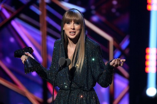 Taylor Swift - 2023 iHeartRadio Music Awards at Dolby Theatre in Hollywood - March 27, 2023

Taylor Swift sports sparkling jumpsuit at iHeartRadio Music Awards 2023

She’s in her innovator era.

Taylor Swift took a break from her Eras Tour to attend Monday night’s iHeartRadio Music Awards 2023, where she’s set to be honored with the Innovator Award during the ceremony.

And while she skipped the red carpet, the pop superstar popped up inside the ceremony, clad in a crystal-covered hooded jacket, pants and boots from Alexandre Vauthier Couture that lent the look of a jumpsuit (and could’ve been plucked straight from her “Reputation” era).

Swift wore her hair sleek and straight, completing her futuristic fashion moment with a silvery smoky eye, glossy nude lip and iridescent manicure, along with jewelry from KatKim and Anita Ko.

Per iHeartRadio’s press release, the Innovator Award is bestowed on an artist who has “impacted global pop culture throughout their career.”

Past recipients include Justin Timberlake, Pharrell Williams, U2, Bruno Mars, Chance the Rapper and Alicia Keys.

Phoebe Bridgers, Swift’s “Nothing New” collaborator and one of the opening acts on her Eras Tour, introduced her during the telecast.

Artists including Ed Sheeran, Selena Gomez, Justin Timberlake and Dolly Parton also spoke about her work and impact on the music industry in a video tribute that played before she took the stage to accept the honor.

Swift is among the night’s most nominated artists.

She’s up for a total of seven awards: Song of the Year, Best Lyrics and Best Music Video (all for “Anti-Hero”), TikTok Bop of the Year (“Bejeweled”), Favorite Use of a Sample (“Question…?”), Best Fan Army and Artist of the Year.

“I think the coolest ideas, motivations or choices are the ones that set a new precedent,” Swift said during her acceptance speech.

While she’s not scheduled to perform during the Lenny Kravitz-hosted ceremony, viewers can look forward to seeing Pink (who’s receiving the Icon Award), Kelly Clarkson, Keith Urban, Latto, Coldplay and Pat Benatar take the stage, among others.