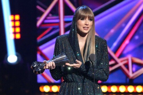 Taylor Swift - 2023 iHeartRadio Music Awards at Dolby Theatre in Hollywood - March 27, 2023

Taylor Swift sports sparkling jumpsuit at iHeartRadio Music Awards 2023

She’s in her innovator era.

Taylor Swift took a break from her Eras Tour to attend Monday night’s iHeartRadio Music Awards 2023, where she’s set to be honored with the Innovator Award during the ceremony.

And while she skipped the red carpet, the pop superstar popped up inside the ceremony, clad in a crystal-covered hooded jacket, pants and boots from Alexandre Vauthier Couture that lent the look of a jumpsuit (and could’ve been plucked straight from her “Reputation” era).

Swift wore her hair sleek and straight, completing her futuristic fashion moment with a silvery smoky eye, glossy nude lip and iridescent manicure, along with jewelry from KatKim and Anita Ko.

Per iHeartRadio’s press release, the Innovator Award is bestowed on an artist who has “impacted global pop culture throughout their career.”

Past recipients include Justin Timberlake, Pharrell Williams, U2, Bruno Mars, Chance the Rapper and Alicia Keys.

Phoebe Bridgers, Swift’s “Nothing New” collaborator and one of the opening acts on her Eras Tour, introduced her during the telecast.

Artists including Ed Sheeran, Selena Gomez, Justin Timberlake and Dolly Parton also spoke about her work and impact on the music industry in a video tribute that played before she took the stage to accept the honor.

Swift is among the night’s most nominated artists.

She’s up for a total of seven awards: Song of the Year, Best Lyrics and Best Music Video (all for “Anti-Hero”), TikTok Bop of the Year (“Bejeweled”), Favorite Use of a Sample (“Question…?”), Best Fan Army and Artist of the Year.

“I think the coolest ideas, motivations or choices are the ones that set a new precedent,” Swift said during her acceptance speech.

While she’s not scheduled to perform during the Lenny Kravitz-hosted ceremony, viewers can look forward to seeing Pink (who’s receiving the Icon Award), Kelly Clarkson, Keith Urban, Latto, Coldplay and Pat Benatar take the stage, among others.