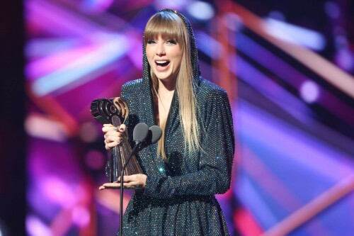 Taylor Swift - 2023 iHeartRadio Music Awards at Dolby Theatre in Hollywood - March 27, 2023

Taylor Swift sports sparkling jumpsuit at iHeartRadio Music Awards 2023

She’s in her innovator era.

Taylor Swift took a break from her Eras Tour to attend Monday night’s iHeartRadio Music Awards 2023, where she’s set to be honored with the Innovator Award during the ceremony.

And while she skipped the red carpet, the pop superstar popped up inside the ceremony, clad in a crystal-covered hooded jacket, pants and boots from Alexandre Vauthier Couture that lent the look of a jumpsuit (and could’ve been plucked straight from her “Reputation” era).

Swift wore her hair sleek and straight, completing her futuristic fashion moment with a silvery smoky eye, glossy nude lip and iridescent manicure, along with jewelry from KatKim and Anita Ko.

Per iHeartRadio’s press release, the Innovator Award is bestowed on an artist who has “impacted global pop culture throughout their career.”

Past recipients include Justin Timberlake, Pharrell Williams, U2, Bruno Mars, Chance the Rapper and Alicia Keys.

Phoebe Bridgers, Swift’s “Nothing New” collaborator and one of the opening acts on her Eras Tour, introduced her during the telecast.

Artists including Ed Sheeran, Selena Gomez, Justin Timberlake and Dolly Parton also spoke about her work and impact on the music industry in a video tribute that played before she took the stage to accept the honor.

Swift is among the night’s most nominated artists.

She’s up for a total of seven awards: Song of the Year, Best Lyrics and Best Music Video (all for “Anti-Hero”), TikTok Bop of the Year (“Bejeweled”), Favorite Use of a Sample (“Question…?”), Best Fan Army and Artist of the Year.

“I think the coolest ideas, motivations or choices are the ones that set a new precedent,” Swift said during her acceptance speech.

While she’s not scheduled to perform during the Lenny Kravitz-hosted ceremony, viewers can look forward to seeing Pink (who’s receiving the Icon Award), Kelly Clarkson, Keith Urban, Latto, Coldplay and Pat Benatar take the stage, among others.