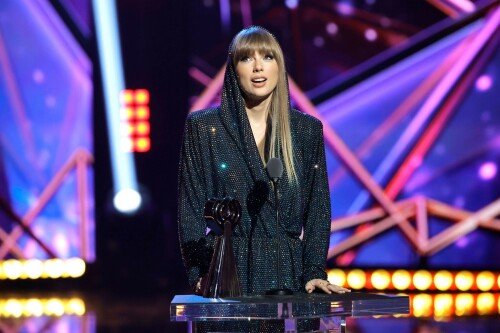 Taylor Swift - 2023 iHeartRadio Music Awards at Dolby Theatre in Hollywood - March 27, 2023

Taylor Swift sports sparkling jumpsuit at iHeartRadio Music Awards 2023

She’s in her innovator era.

Taylor Swift took a break from her Eras Tour to attend Monday night’s iHeartRadio Music Awards 2023, where she’s set to be honored with the Innovator Award during the ceremony.

And while she skipped the red carpet, the pop superstar popped up inside the ceremony, clad in a crystal-covered hooded jacket, pants and boots from Alexandre Vauthier Couture that lent the look of a jumpsuit (and could’ve been plucked straight from her “Reputation” era).

Swift wore her hair sleek and straight, completing her futuristic fashion moment with a silvery smoky eye, glossy nude lip and iridescent manicure, along with jewelry from KatKim and Anita Ko.

Per iHeartRadio’s press release, the Innovator Award is bestowed on an artist who has “impacted global pop culture throughout their career.”

Past recipients include Justin Timberlake, Pharrell Williams, U2, Bruno Mars, Chance the Rapper and Alicia Keys.

Phoebe Bridgers, Swift’s “Nothing New” collaborator and one of the opening acts on her Eras Tour, introduced her during the telecast.

Artists including Ed Sheeran, Selena Gomez, Justin Timberlake and Dolly Parton also spoke about her work and impact on the music industry in a video tribute that played before she took the stage to accept the honor.

Swift is among the night’s most nominated artists.

She’s up for a total of seven awards: Song of the Year, Best Lyrics and Best Music Video (all for “Anti-Hero”), TikTok Bop of the Year (“Bejeweled”), Favorite Use of a Sample (“Question…?”), Best Fan Army and Artist of the Year.

“I think the coolest ideas, motivations or choices are the ones that set a new precedent,” Swift said during her acceptance speech.

While she’s not scheduled to perform during the Lenny Kravitz-hosted ceremony, viewers can look forward to seeing Pink (who’s receiving the Icon Award), Kelly Clarkson, Keith Urban, Latto, Coldplay and Pat Benatar take the stage, among others.