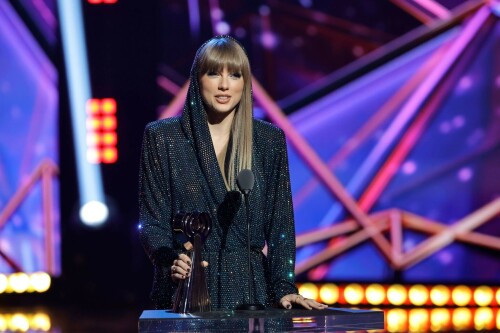 Taylor Swift - 2023 iHeartRadio Music Awards at Dolby Theatre in Hollywood - March 27, 2023

Taylor Swift sports sparkling jumpsuit at iHeartRadio Music Awards 2023

She’s in her innovator era.

Taylor Swift took a break from her Eras Tour to attend Monday night’s iHeartRadio Music Awards 2023, where she’s set to be honored with the Innovator Award during the ceremony.

And while she skipped the red carpet, the pop superstar popped up inside the ceremony, clad in a crystal-covered hooded jacket, pants and boots from Alexandre Vauthier Couture that lent the look of a jumpsuit (and could’ve been plucked straight from her “Reputation” era).

Swift wore her hair sleek and straight, completing her futuristic fashion moment with a silvery smoky eye, glossy nude lip and iridescent manicure, along with jewelry from KatKim and Anita Ko.

Per iHeartRadio’s press release, the Innovator Award is bestowed on an artist who has “impacted global pop culture throughout their career.”

Past recipients include Justin Timberlake, Pharrell Williams, U2, Bruno Mars, Chance the Rapper and Alicia Keys.

Phoebe Bridgers, Swift’s “Nothing New” collaborator and one of the opening acts on her Eras Tour, introduced her during the telecast.

Artists including Ed Sheeran, Selena Gomez, Justin Timberlake and Dolly Parton also spoke about her work and impact on the music industry in a video tribute that played before she took the stage to accept the honor.

Swift is among the night’s most nominated artists.

She’s up for a total of seven awards: Song of the Year, Best Lyrics and Best Music Video (all for “Anti-Hero”), TikTok Bop of the Year (“Bejeweled”), Favorite Use of a Sample (“Question…?”), Best Fan Army and Artist of the Year.

“I think the coolest ideas, motivations or choices are the ones that set a new precedent,” Swift said during her acceptance speech.

While she’s not scheduled to perform during the Lenny Kravitz-hosted ceremony, viewers can look forward to seeing Pink (who’s receiving the Icon Award), Kelly Clarkson, Keith Urban, Latto, Coldplay and Pat Benatar take the stage, among others.