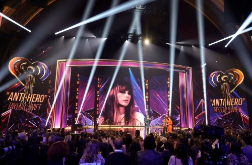 Taylor Swift - 2023 iHeartRadio Music Awards at Dolby Theatre in Hollywood - March 27, 2023

Taylor Swift sports sparkling jumpsuit at iHeartRadio Music Awards 2023

She’s in her innovator era.

Taylor Swift took a break from her Eras Tour to attend Monday night’s iHeartRadio Music Awards 2023, where she’s set to be honored with the Innovator Award during the ceremony.

And while she skipped the red carpet, the pop superstar popped up inside the ceremony, clad in a crystal-covered hooded jacket, pants and boots from Alexandre Vauthier Couture that lent the look of a jumpsuit (and could’ve been plucked straight from her “Reputation” era).

Swift wore her hair sleek and straight, completing her futuristic fashion moment with a silvery smoky eye, glossy nude lip and iridescent manicure, along with jewelry from KatKim and Anita Ko.

Per iHeartRadio’s press release, the Innovator Award is bestowed on an artist who has “impacted global pop culture throughout their career.”

Past recipients include Justin Timberlake, Pharrell Williams, U2, Bruno Mars, Chance the Rapper and Alicia Keys.

Phoebe Bridgers, Swift’s “Nothing New” collaborator and one of the opening acts on her Eras Tour, introduced her during the telecast.

Artists including Ed Sheeran, Selena Gomez, Justin Timberlake and Dolly Parton also spoke about her work and impact on the music industry in a video tribute that played before she took the stage to accept the honor.

Swift is among the night’s most nominated artists.

She’s up for a total of seven awards: Song of the Year, Best Lyrics and Best Music Video (all for “Anti-Hero”), TikTok Bop of the Year (“Bejeweled”), Favorite Use of a Sample (“Question…?”), Best Fan Army and Artist of the Year.

“I think the coolest ideas, motivations or choices are the ones that set a new precedent,” Swift said during her acceptance speech.

While she’s not scheduled to perform during the Lenny Kravitz-hosted ceremony, viewers can look forward to seeing Pink (who’s receiving the Icon Award), Kelly Clarkson, Keith Urban, Latto, Coldplay and Pat Benatar take the stage, among others.