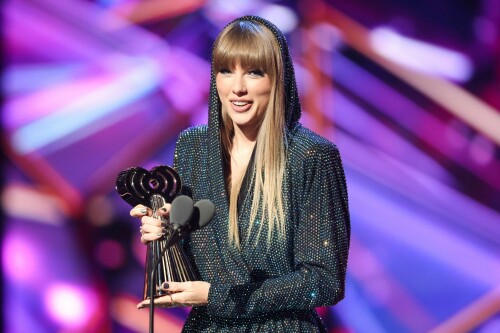 Taylor Swift - 2023 iHeartRadio Music Awards at Dolby Theatre in Hollywood - March 27, 2023

Taylor Swift sports sparkling jumpsuit at iHeartRadio Music Awards 2023

She’s in her innovator era.

Taylor Swift took a break from her Eras Tour to attend Monday night’s iHeartRadio Music Awards 2023, where she’s set to be honored with the Innovator Award during the ceremony.

And while she skipped the red carpet, the pop superstar popped up inside the ceremony, clad in a crystal-covered hooded jacket, pants and boots from Alexandre Vauthier Couture that lent the look of a jumpsuit (and could’ve been plucked straight from her “Reputation” era).

Swift wore her hair sleek and straight, completing her futuristic fashion moment with a silvery smoky eye, glossy nude lip and iridescent manicure, along with jewelry from KatKim and Anita Ko.

Per iHeartRadio’s press release, the Innovator Award is bestowed on an artist who has “impacted global pop culture throughout their career.”

Past recipients include Justin Timberlake, Pharrell Williams, U2, Bruno Mars, Chance the Rapper and Alicia Keys.

Phoebe Bridgers, Swift’s “Nothing New” collaborator and one of the opening acts on her Eras Tour, introduced her during the telecast.

Artists including Ed Sheeran, Selena Gomez, Justin Timberlake and Dolly Parton also spoke about her work and impact on the music industry in a video tribute that played before she took the stage to accept the honor.

Swift is among the night’s most nominated artists.

She’s up for a total of seven awards: Song of the Year, Best Lyrics and Best Music Video (all for “Anti-Hero”), TikTok Bop of the Year (“Bejeweled”), Favorite Use of a Sample (“Question…?”), Best Fan Army and Artist of the Year.

“I think the coolest ideas, motivations or choices are the ones that set a new precedent,” Swift said during her acceptance speech.

While she’s not scheduled to perform during the Lenny Kravitz-hosted ceremony, viewers can look forward to seeing Pink (who’s receiving the Icon Award), Kelly Clarkson, Keith Urban, Latto, Coldplay and Pat Benatar take the stage, among others.