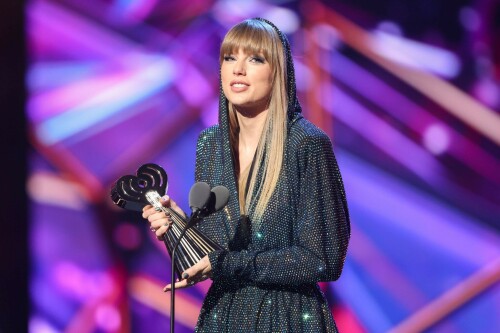 Taylor Swift - 2023 iHeartRadio Music Awards at Dolby Theatre in Hollywood - March 27, 2023

Taylor Swift sports sparkling jumpsuit at iHeartRadio Music Awards 2023

She’s in her innovator era.

Taylor Swift took a break from her Eras Tour to attend Monday night’s iHeartRadio Music Awards 2023, where she’s set to be honored with the Innovator Award during the ceremony.

And while she skipped the red carpet, the pop superstar popped up inside the ceremony, clad in a crystal-covered hooded jacket, pants and boots from Alexandre Vauthier Couture that lent the look of a jumpsuit (and could’ve been plucked straight from her “Reputation” era).

Swift wore her hair sleek and straight, completing her futuristic fashion moment with a silvery smoky eye, glossy nude lip and iridescent manicure, along with jewelry from KatKim and Anita Ko.

Per iHeartRadio’s press release, the Innovator Award is bestowed on an artist who has “impacted global pop culture throughout their career.”

Past recipients include Justin Timberlake, Pharrell Williams, U2, Bruno Mars, Chance the Rapper and Alicia Keys.

Phoebe Bridgers, Swift’s “Nothing New” collaborator and one of the opening acts on her Eras Tour, introduced her during the telecast.

Artists including Ed Sheeran, Selena Gomez, Justin Timberlake and Dolly Parton also spoke about her work and impact on the music industry in a video tribute that played before she took the stage to accept the honor.

Swift is among the night’s most nominated artists.

She’s up for a total of seven awards: Song of the Year, Best Lyrics and Best Music Video (all for “Anti-Hero”), TikTok Bop of the Year (“Bejeweled”), Favorite Use of a Sample (“Question…?”), Best Fan Army and Artist of the Year.

“I think the coolest ideas, motivations or choices are the ones that set a new precedent,” Swift said during her acceptance speech.

While she’s not scheduled to perform during the Lenny Kravitz-hosted ceremony, viewers can look forward to seeing Pink (who’s receiving the Icon Award), Kelly Clarkson, Keith Urban, Latto, Coldplay and Pat Benatar take the stage, among others.