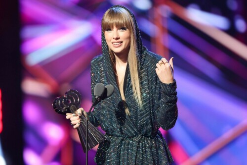 Taylor Swift - 2023 iHeartRadio Music Awards at Dolby Theatre in Hollywood - March 27, 2023

Taylor Swift sports sparkling jumpsuit at iHeartRadio Music Awards 2023

She’s in her innovator era.

Taylor Swift took a break from her Eras Tour to attend Monday night’s iHeartRadio Music Awards 2023, where she’s set to be honored with the Innovator Award during the ceremony.

And while she skipped the red carpet, the pop superstar popped up inside the ceremony, clad in a crystal-covered hooded jacket, pants and boots from Alexandre Vauthier Couture that lent the look of a jumpsuit (and could’ve been plucked straight from her “Reputation” era).

Swift wore her hair sleek and straight, completing her futuristic fashion moment with a silvery smoky eye, glossy nude lip and iridescent manicure, along with jewelry from KatKim and Anita Ko.

Per iHeartRadio’s press release, the Innovator Award is bestowed on an artist who has “impacted global pop culture throughout their career.”

Past recipients include Justin Timberlake, Pharrell Williams, U2, Bruno Mars, Chance the Rapper and Alicia Keys.

Phoebe Bridgers, Swift’s “Nothing New” collaborator and one of the opening acts on her Eras Tour, introduced her during the telecast.

Artists including Ed Sheeran, Selena Gomez, Justin Timberlake and Dolly Parton also spoke about her work and impact on the music industry in a video tribute that played before she took the stage to accept the honor.

Swift is among the night’s most nominated artists.

She’s up for a total of seven awards: Song of the Year, Best Lyrics and Best Music Video (all for “Anti-Hero”), TikTok Bop of the Year (“Bejeweled”), Favorite Use of a Sample (“Question…?”), Best Fan Army and Artist of the Year.

“I think the coolest ideas, motivations or choices are the ones that set a new precedent,” Swift said during her acceptance speech.

While she’s not scheduled to perform during the Lenny Kravitz-hosted ceremony, viewers can look forward to seeing Pink (who’s receiving the Icon Award), Kelly Clarkson, Keith Urban, Latto, Coldplay and Pat Benatar take the stage, among others.