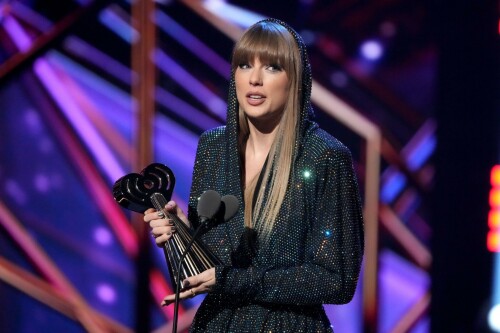 Taylor Swift - 2023 iHeartRadio Music Awards at Dolby Theatre in Hollywood - March 27, 2023

Taylor Swift sports sparkling jumpsuit at iHeartRadio Music Awards 2023

She’s in her innovator era.

Taylor Swift took a break from her Eras Tour to attend Monday night’s iHeartRadio Music Awards 2023, where she’s set to be honored with the Innovator Award during the ceremony.

And while she skipped the red carpet, the pop superstar popped up inside the ceremony, clad in a crystal-covered hooded jacket, pants and boots from Alexandre Vauthier Couture that lent the look of a jumpsuit (and could’ve been plucked straight from her “Reputation” era).

Swift wore her hair sleek and straight, completing her futuristic fashion moment with a silvery smoky eye, glossy nude lip and iridescent manicure, along with jewelry from KatKim and Anita Ko.

Per iHeartRadio’s press release, the Innovator Award is bestowed on an artist who has “impacted global pop culture throughout their career.”

Past recipients include Justin Timberlake, Pharrell Williams, U2, Bruno Mars, Chance the Rapper and Alicia Keys.

Phoebe Bridgers, Swift’s “Nothing New” collaborator and one of the opening acts on her Eras Tour, introduced her during the telecast.

Artists including Ed Sheeran, Selena Gomez, Justin Timberlake and Dolly Parton also spoke about her work and impact on the music industry in a video tribute that played before she took the stage to accept the honor.

Swift is among the night’s most nominated artists.

She’s up for a total of seven awards: Song of the Year, Best Lyrics and Best Music Video (all for “Anti-Hero”), TikTok Bop of the Year (“Bejeweled”), Favorite Use of a Sample (“Question…?”), Best Fan Army and Artist of the Year.

“I think the coolest ideas, motivations or choices are the ones that set a new precedent,” Swift said during her acceptance speech.

While she’s not scheduled to perform during the Lenny Kravitz-hosted ceremony, viewers can look forward to seeing Pink (who’s receiving the Icon Award), Kelly Clarkson, Keith Urban, Latto, Coldplay and Pat Benatar take the stage, among others.