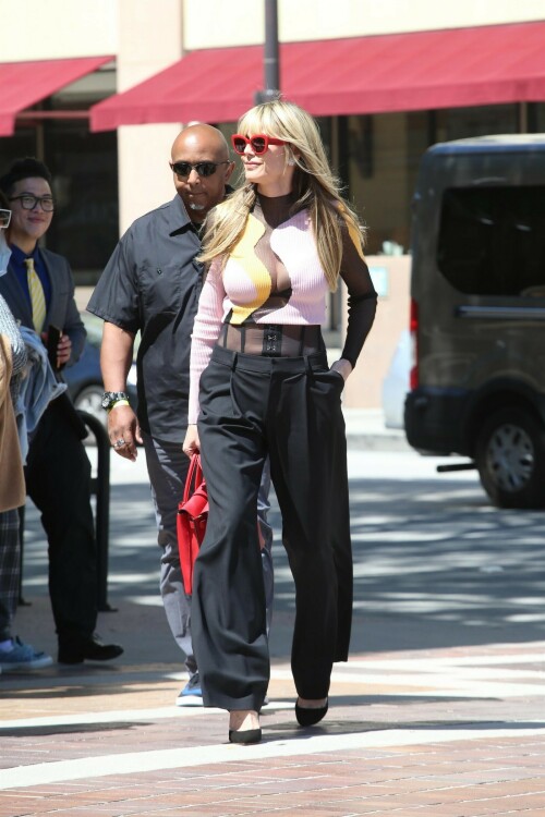 Heidi Klum is seen on March 28, 2023 in Los Angeles, CA.

Her celebrity style: Camila Coelho Raina Top, Monse Corset-Style High-Waist Trousers, Kilian Kerner x Fielmann 018 Fa Sunglasses, MCM Milla Tote Bag in Ruby Red

#HeidiKlum