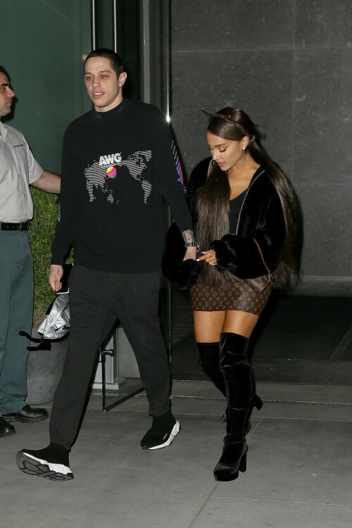 Ariana Grande Celebrating Her 25th Birthday - June 25, 2018

Wearing: Prette Not Fake But Faux Bomber Jacket + Louis Vuitton Monogram Mini Papillon

Ariana Grande celebrated turning 25 with friends, family and fiance Pete Davidson

Ariana Grande turned 25 Tuesday, but she kicked off the celebration a day early with friends, her brother Frankie Grande and fiance Pete Davidson.

Multiple videos posted by the singer, her friends, and family show Grande marking the occasion with dancing and cakes decorated with old photos of her.

Grande also shared a snap of a colorful book filled with special messages from her friends.

"To the friends of mine who wrote me a note in this book (Courtney’s idea), I am sobbing my eyes out right now," she wrote in the caption. "I love you so much and don’t know what I’d do without you. This is the best gift I’ve ever been given ever. I love you so much. Omg."

Earlier in the day, Grande was seen heading into a party with Davidson.

Later, he posted a touching birthday tribute to his "precious angel."

"Happy birthday to the most precious angel on earth! You’re my favorite person that ever existed :) I love you sm," Davidson posted on social media around midnight, alongside a photo of him carrying Grande on his back.

And because he couldn't resist, he posted another photo an hour later, writing, "One more for the queen."

Just days ago, the "Saturday Night Live" star confirmed his engagement to Grande on "The Tonight Show."

"I feel like I won a contest," the actor told host Jimmy Fallon of his engagement to the singer and actress. "It's so sick."