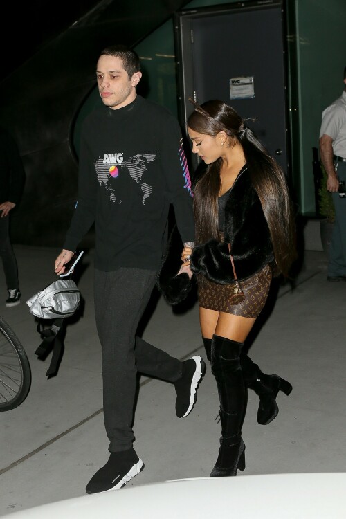 Ariana Grande Celebrating Her 25th Birthday - June 25, 2018

Wearing: Prette Not Fake But Faux Bomber Jacket + Louis Vuitton Monogram Mini Papillon

Ariana Grande celebrated turning 25 with friends, family and fiance Pete Davidson

Ariana Grande turned 25 Tuesday, but she kicked off the celebration a day early with friends, her brother Frankie Grande and fiance Pete Davidson.

Multiple videos posted by the singer, her friends, and family show Grande marking the occasion with dancing and cakes decorated with old photos of her.

Grande also shared a snap of a colorful book filled with special messages from her friends.

"To the friends of mine who wrote me a note in this book (Courtney’s idea), I am sobbing my eyes out right now," she wrote in the caption. "I love you so much and don’t know what I’d do without you. This is the best gift I’ve ever been given ever. I love you so much. Omg."

Earlier in the day, Grande was seen heading into a party with Davidson.

Later, he posted a touching birthday tribute to his "precious angel."

"Happy birthday to the most precious angel on earth! You’re my favorite person that ever existed :) I love you sm," Davidson posted on social media around midnight, alongside a photo of him carrying Grande on his back.

And because he couldn't resist, he posted another photo an hour later, writing, "One more for the queen."

Just days ago, the "Saturday Night Live" star confirmed his engagement to Grande on "The Tonight Show."

"I feel like I won a contest," the actor told host Jimmy Fallon of his engagement to the singer and actress. "It's so sick."