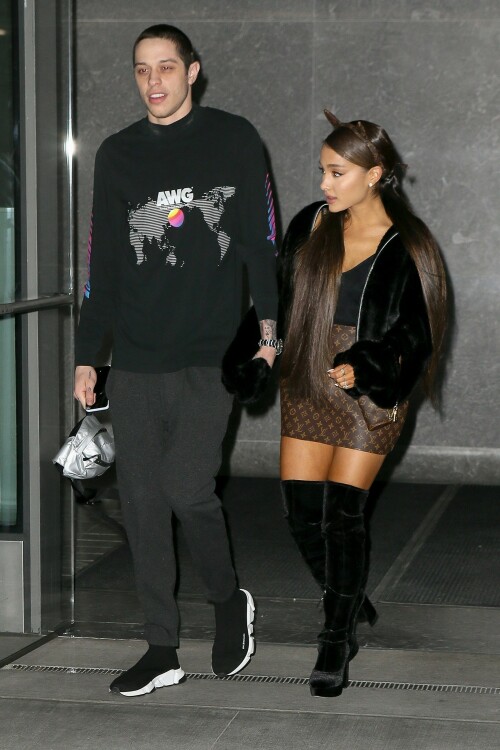 Ariana Grande Celebrating Her 25th Birthday - June 25, 2018

Wearing: Prette Not Fake But Faux Bomber Jacket + Louis Vuitton Monogram Mini Papillon

Ariana Grande celebrated turning 25 with friends, family and fiance Pete Davidson

Ariana Grande turned 25 Tuesday, but she kicked off the celebration a day early with friends, her brother Frankie Grande and fiance Pete Davidson.

Multiple videos posted by the singer, her friends, and family show Grande marking the occasion with dancing and cakes decorated with old photos of her.

Grande also shared a snap of a colorful book filled with special messages from her friends.

"To the friends of mine who wrote me a note in this book (Courtney’s idea), I am sobbing my eyes out right now," she wrote in the caption. "I love you so much and don’t know what I’d do without you. This is the best gift I’ve ever been given ever. I love you so much. Omg."

Earlier in the day, Grande was seen heading into a party with Davidson.

Later, he posted a touching birthday tribute to his "precious angel."

"Happy birthday to the most precious angel on earth! You’re my favorite person that ever existed :) I love you sm," Davidson posted on social media around midnight, alongside a photo of him carrying Grande on his back.

And because he couldn't resist, he posted another photo an hour later, writing, "One more for the queen."

Just days ago, the "Saturday Night Live" star confirmed his engagement to Grande on "The Tonight Show."

"I feel like I won a contest," the actor told host Jimmy Fallon of his engagement to the singer and actress. "It's so sick."