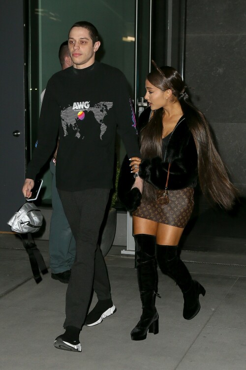 Ariana Grande Celebrating Her 25th Birthday - June 25, 2018

Wearing: Prette Not Fake But Faux Bomber Jacket + Louis Vuitton Monogram Mini Papillon

Ariana Grande celebrated turning 25 with friends, family and fiance Pete Davidson

Ariana Grande turned 25 Tuesday, but she kicked off the celebration a day early with friends, her brother Frankie Grande and fiance Pete Davidson.

Multiple videos posted by the singer, her friends, and family show Grande marking the occasion with dancing and cakes decorated with old photos of her.

Grande also shared a snap of a colorful book filled with special messages from her friends.

"To the friends of mine who wrote me a note in this book (Courtney’s idea), I am sobbing my eyes out right now," she wrote in the caption. "I love you so much and don’t know what I’d do without you. This is the best gift I’ve ever been given ever. I love you so much. Omg."

Earlier in the day, Grande was seen heading into a party with Davidson.

Later, he posted a touching birthday tribute to his "precious angel."

"Happy birthday to the most precious angel on earth! You’re my favorite person that ever existed :) I love you sm," Davidson posted on social media around midnight, alongside a photo of him carrying Grande on his back.

And because he couldn't resist, he posted another photo an hour later, writing, "One more for the queen."

Just days ago, the "Saturday Night Live" star confirmed his engagement to Grande on "The Tonight Show."

"I feel like I won a contest," the actor told host Jimmy Fallon of his engagement to the singer and actress. "It's so sick."