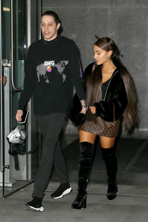 Ariana Grande Celebrating Her 25th Birthday - June 25, 2018

Wearing: Prette Not Fake But Faux Bomber Jacket + Louis Vuitton Monogram Mini Papillon

Ariana Grande celebrated turning 25 with friends, family and fiance Pete Davidson

Ariana Grande turned 25 Tuesday, but she kicked off the celebration a day early with friends, her brother Frankie Grande and fiance Pete Davidson.

Multiple videos posted by the singer, her friends, and family show Grande marking the occasion with dancing and cakes decorated with old photos of her.

Grande also shared a snap of a colorful book filled with special messages from her friends.

"To the friends of mine who wrote me a note in this book (Courtney’s idea), I am sobbing my eyes out right now," she wrote in the caption. "I love you so much and don’t know what I’d do without you. This is the best gift I’ve ever been given ever. I love you so much. Omg."

Earlier in the day, Grande was seen heading into a party with Davidson.

Later, he posted a touching birthday tribute to his "precious angel."

"Happy birthday to the most precious angel on earth! You’re my favorite person that ever existed :) I love you sm," Davidson posted on social media around midnight, alongside a photo of him carrying Grande on his back.

And because he couldn't resist, he posted another photo an hour later, writing, "One more for the queen."

Just days ago, the "Saturday Night Live" star confirmed his engagement to Grande on "The Tonight Show."

"I feel like I won a contest," the actor told host Jimmy Fallon of his engagement to the singer and actress. "It's so sick."