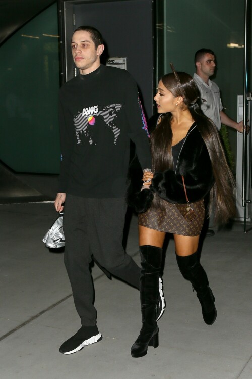 Ariana Grande Celebrating Her 25th Birthday - June 25, 2018

Wearing: Prette Not Fake But Faux Bomber Jacket + Louis Vuitton Monogram Mini Papillon

Ariana Grande celebrated turning 25 with friends, family and fiance Pete Davidson

Ariana Grande turned 25 Tuesday, but she kicked off the celebration a day early with friends, her brother Frankie Grande and fiance Pete Davidson.

Multiple videos posted by the singer, her friends, and family show Grande marking the occasion with dancing and cakes decorated with old photos of her.

Grande also shared a snap of a colorful book filled with special messages from her friends.

"To the friends of mine who wrote me a note in this book (Courtney’s idea), I am sobbing my eyes out right now," she wrote in the caption. "I love you so much and don’t know what I’d do without you. This is the best gift I’ve ever been given ever. I love you so much. Omg."

Earlier in the day, Grande was seen heading into a party with Davidson.

Later, he posted a touching birthday tribute to his "precious angel."

"Happy birthday to the most precious angel on earth! You’re my favorite person that ever existed :) I love you sm," Davidson posted on social media around midnight, alongside a photo of him carrying Grande on his back.

And because he couldn't resist, he posted another photo an hour later, writing, "One more for the queen."

Just days ago, the "Saturday Night Live" star confirmed his engagement to Grande on "The Tonight Show."

"I feel like I won a contest," the actor told host Jimmy Fallon of his engagement to the singer and actress. "It's so sick."