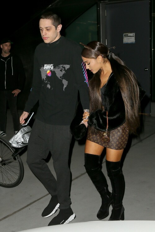 Ariana Grande Celebrating Her 25th Birthday - June 25, 2018

Wearing: Prette Not Fake But Faux Bomber Jacket + Louis Vuitton Monogram Mini Papillon

Ariana Grande celebrated turning 25 with friends, family and fiance Pete Davidson

Ariana Grande turned 25 Tuesday, but she kicked off the celebration a day early with friends, her brother Frankie Grande and fiance Pete Davidson.

Multiple videos posted by the singer, her friends, and family show Grande marking the occasion with dancing and cakes decorated with old photos of her.

Grande also shared a snap of a colorful book filled with special messages from her friends.

"To the friends of mine who wrote me a note in this book (Courtney’s idea), I am sobbing my eyes out right now," she wrote in the caption. "I love you so much and don’t know what I’d do without you. This is the best gift I’ve ever been given ever. I love you so much. Omg."

Earlier in the day, Grande was seen heading into a party with Davidson.

Later, he posted a touching birthday tribute to his "precious angel."

"Happy birthday to the most precious angel on earth! You’re my favorite person that ever existed :) I love you sm," Davidson posted on social media around midnight, alongside a photo of him carrying Grande on his back.

And because he couldn't resist, he posted another photo an hour later, writing, "One more for the queen."

Just days ago, the "Saturday Night Live" star confirmed his engagement to Grande on "The Tonight Show."

"I feel like I won a contest," the actor told host Jimmy Fallon of his engagement to the singer and actress. "It's so sick."