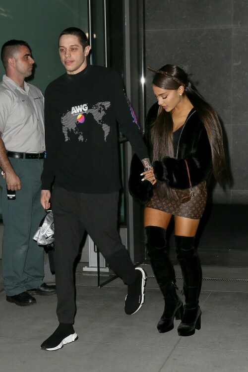 Ariana Grande Celebrating Her 25th Birthday - June 25, 2018

Wearing: Prette Not Fake But Faux Bomber Jacket + Louis Vuitton Monogram Mini Papillon

Ariana Grande celebrated turning 25 with friends, family and fiance Pete Davidson

Ariana Grande turned 25 Tuesday, but she kicked off the celebration a day early with friends, her brother Frankie Grande and fiance Pete Davidson.

Multiple videos posted by the singer, her friends, and family show Grande marking the occasion with dancing and cakes decorated with old photos of her.

Grande also shared a snap of a colorful book filled with special messages from her friends.

"To the friends of mine who wrote me a note in this book (Courtney’s idea), I am sobbing my eyes out right now," she wrote in the caption. "I love you so much and don’t know what I’d do without you. This is the best gift I’ve ever been given ever. I love you so much. Omg."

Earlier in the day, Grande was seen heading into a party with Davidson.

Later, he posted a touching birthday tribute to his "precious angel."

"Happy birthday to the most precious angel on earth! You’re my favorite person that ever existed :) I love you sm," Davidson posted on social media around midnight, alongside a photo of him carrying Grande on his back.

And because he couldn't resist, he posted another photo an hour later, writing, "One more for the queen."

Just days ago, the "Saturday Night Live" star confirmed his engagement to Grande on "The Tonight Show."

"I feel like I won a contest," the actor told host Jimmy Fallon of his engagement to the singer and actress. "It's so sick."