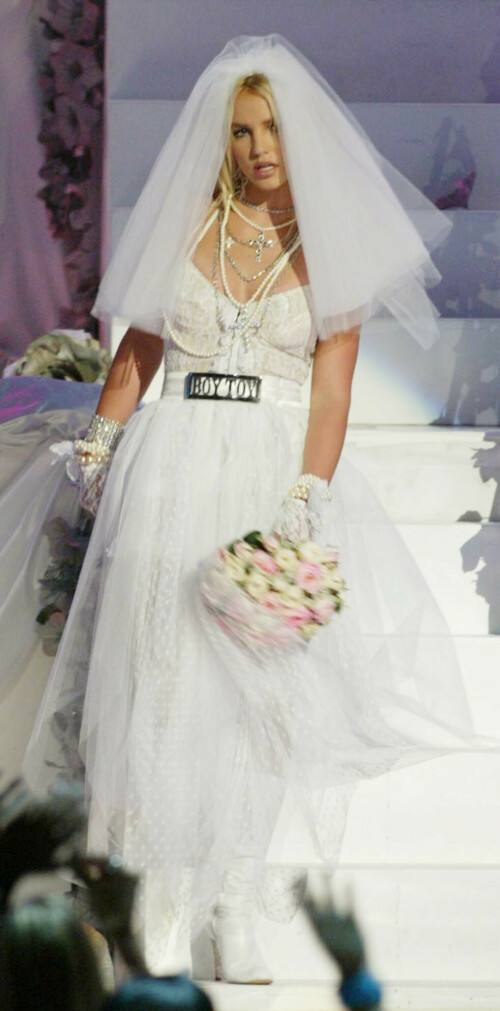 In August 28, 2003, Britney Spears simply stunned the whole world with her performance in a wedding dress, along with Madonna as the groom and black-haired Christina Aguilera as the second bride. The apogee of the performance with the songs of 'Like A Virgin' and 'Hollywood' was the passionate kiss of Britney Spears and Madonna, and then Madonna and Christina Aguilera, it turned out so unexpectedly and sexy that it is discussed with the enthusiast to this day. The performance became legendary and entered the history of world pop music.

#VMAs #BritneySpears #Madonna #ChristinaAguilera #MissyElliott