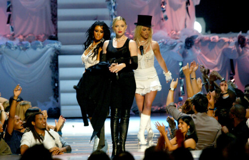 In August 28, 2003, Britney Spears simply stunned the whole world with her performance in a wedding dress, along with Madonna as the groom and black-haired Christina Aguilera as the second bride. The apogee of the performance with the songs of 'Like A Virgin' and 'Hollywood' was the passionate kiss of Britney Spears and Madonna, and then Madonna and Christina Aguilera, it turned out so unexpectedly and sexy that it is discussed with the enthusiast to this day. The performance became legendary and entered the history of world pop music.

#VMAs #BritneySpears #Madonna #ChristinaAguilera #MissyElliott