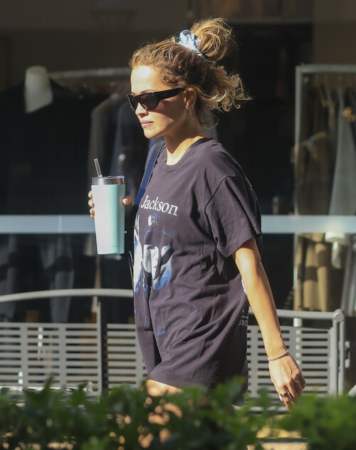 Rita Ora Candids - Out Shopping In Double Bay, Sydney, Australia - March 31, 2023

Her Celebrity Style: Vintage 1989 Janet Jackson Rhythm Nation 1814 Concert Tour T Shirt + Selvatore Ferragamo Geometric Shoulder Bag