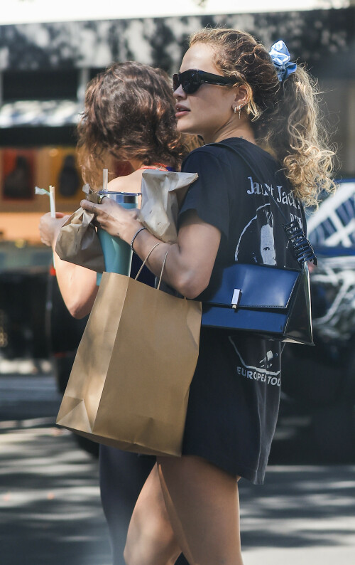 Rita Ora Candids - Out Shopping In Double Bay, Sydney, Australia - March 31, 2023

Her Celebrity Style: Vintage 1989 Janet Jackson Rhythm Nation 1814 Concert Tour T Shirt + Selvatore Ferragamo Geometric Shoulder Bag