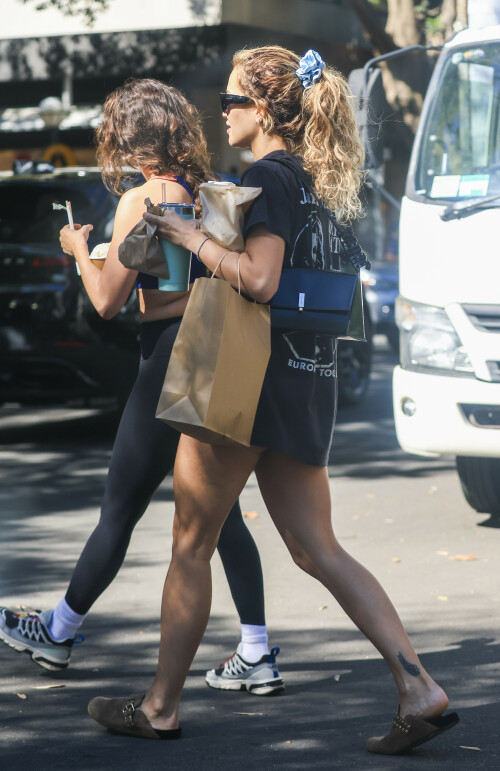 Rita Ora Candids - Out Shopping In Double Bay, Sydney, Australia - March 31, 2023

Her Celebrity Style: Vintage 1989 Janet Jackson Rhythm Nation 1814 Concert Tour T Shirt + Selvatore Ferragamo Geometric Shoulder Bag