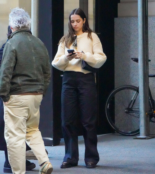 Ana de Armas Candids In New York City - April 9, 2023

Wearing: Louis Vuitton Elbow Patch Ribbed Pullover + Louis Vuitton Dressy Wide-Leg Pants + Louis Vuitton Academy Loafer + Louis Vuitton Pochette Coussin