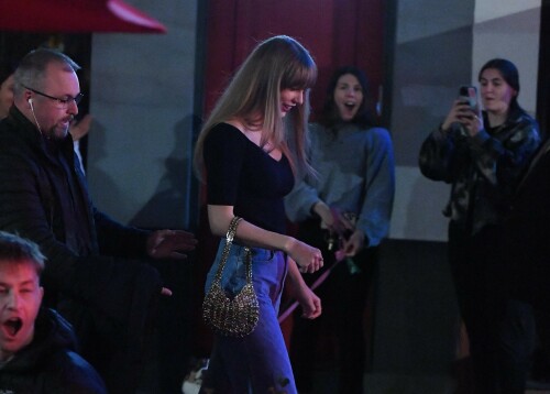 Taylor Swift Spotted In New York City - Candids - April 10, 2023

Her Style:The Row Grais Ribbed-Knit Virgin Wool Top + Area Embellished Cut out Jeans + Sam Edelman Jildie Mary Jane Slingback Pumps + Paco Rabanne 1969 Small Moon Bag