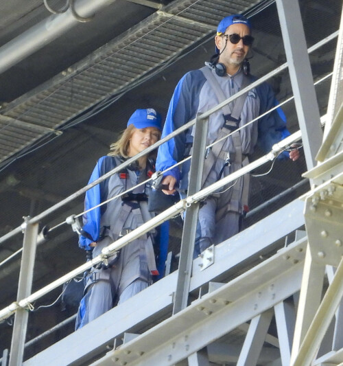 Euphoria Star Sydney Sweeney Spends Easter Holiday Climbing Sydney Harbour Bridge

Sydney Sweeney is currently shooting a new romantic comedy in Australia.

On Easter Sunday, the actress spent her day off climbing the Sydney Harbor Bridge alongside her co-star, Glen Powell, 34.

The Euphoria star shone as she took in the breathtaking view from far above the city.

The 25-year-old was decked out in a climbing suit in shades of gray and blue and a safety harness.

She completed her look with a baby cap and minimal make-up for the strenuous climb.

Sydney Sweeney is currently shooting a new romantic comedy in Australia

On Easter Sunday, the actress spent her day off climbing the Sydney Harbor Bridge alongside her co-star, Glen Powell

The Euphoria star shone as she took in the breathtaking view from far above the city

The beauty had her blonde locks around her face and a pair of headphones around her neck.

Glen opted for the same ensemble, with a classic climbing suit and matching blue cap.

Last month, the two took a break from filming to visit the Taronga Zoo together and feed giraffes.

Sydney has been Down Under for several weeks now and last week visited another popular tourist spot – Luna Park.

A guide led the actress up the many steps to the top of the bridge

She has filmed in locations around the city, including the inner-city suburb of Surry Hills and Double Bay, in the east of the city.

The yet-to-be-titled romantic comedy is directed by Will Gluck, who helmed the romantic comedies Easy A and Friends With Benefits.

Details about the plot of the R-rated movie are being kept under wraps, but the movie will also star Bryan Brown, Michelle Hurd, Hadley Robinson, and Darren Barnet.

The project is expected to bring in AUD$41 million to the local New South Wales economy and create more than 440 jobs for cast and crew.

Details about the plot of the R-rated movie are being kept under wraps, but the movie will also star Bryan Brown, Michelle Hurd, Hadley Robinson and Darren Barnet

The actress is best known for starring in The White Lotus and playing Cassie Howard on the HBO hit show Euphoria.

Sydney is engaged to Jonathan Davino, 37, a millionaire restaurant owner. The couple confirmed their engagement to People in March last year.

Sweeney and her fiancé were first spotted in each other’s company in 2018.

The actress made a rare statement about her love life during an interview with Cosmopolitan last year, saying she wasn’t romantically interested in anyone who works in the entertainment industry.

Maverick star Glen was spotted picking up his gorgeous model girlfriend Gigi Paris from the airport in Australia last month, while Gigi came to visit him on location

“I don’t date people who are in the spotlight. I don’t date actors or musicians or anyone in the entertainment business because that way I can just be normal Syd and it’s easiest. I have a great support system,” she said.

The artist did speak about the qualities she was looking for in a partner.

‘I’m looking for a best friend. I need to be able to be with someone who I can hang out with literally 24/7 and who I never tire of and who we laugh about every day,” she said.

Maverick star Glen was spotted last month picking up his gorgeous model girlfriend Gigi Paris from the airport in Australia, while Gigi came to visit him on location.