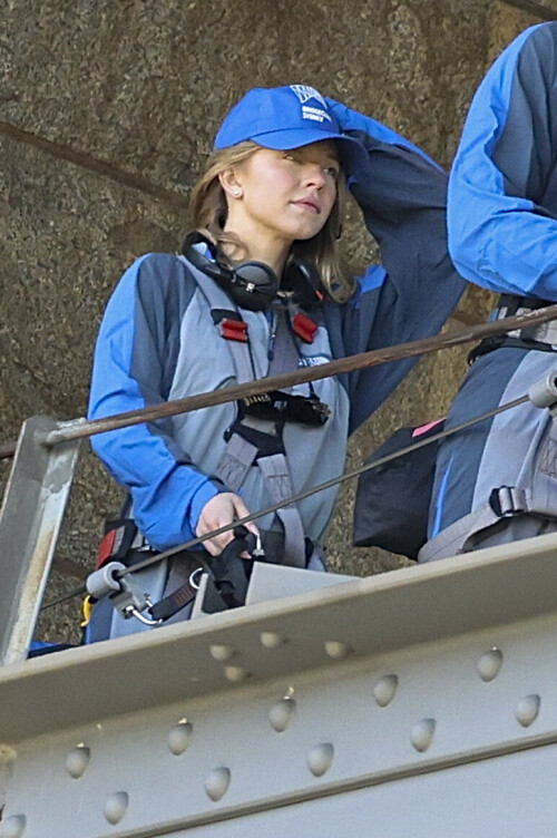 Euphoria Star Sydney Sweeney Spends Easter Holiday Climbing Sydney Harbour Bridge

Sydney Sweeney is currently shooting a new romantic comedy in Australia.

On Easter Sunday, the actress spent her day off climbing the Sydney Harbor Bridge alongside her co-star, Glen Powell, 34.

The Euphoria star shone as she took in the breathtaking view from far above the city.

The 25-year-old was decked out in a climbing suit in shades of gray and blue and a safety harness.

She completed her look with a baby cap and minimal make-up for the strenuous climb.

Sydney Sweeney is currently shooting a new romantic comedy in Australia

On Easter Sunday, the actress spent her day off climbing the Sydney Harbor Bridge alongside her co-star, Glen Powell

The Euphoria star shone as she took in the breathtaking view from far above the city

The beauty had her blonde locks around her face and a pair of headphones around her neck.

Glen opted for the same ensemble, with a classic climbing suit and matching blue cap.

Last month, the two took a break from filming to visit the Taronga Zoo together and feed giraffes.

Sydney has been Down Under for several weeks now and last week visited another popular tourist spot – Luna Park.

A guide led the actress up the many steps to the top of the bridge

She has filmed in locations around the city, including the inner-city suburb of Surry Hills and Double Bay, in the east of the city.

The yet-to-be-titled romantic comedy is directed by Will Gluck, who helmed the romantic comedies Easy A and Friends With Benefits.

Details about the plot of the R-rated movie are being kept under wraps, but the movie will also star Bryan Brown, Michelle Hurd, Hadley Robinson, and Darren Barnet.

The project is expected to bring in AUD$41 million to the local New South Wales economy and create more than 440 jobs for cast and crew.

Details about the plot of the R-rated movie are being kept under wraps, but the movie will also star Bryan Brown, Michelle Hurd, Hadley Robinson and Darren Barnet

The actress is best known for starring in The White Lotus and playing Cassie Howard on the HBO hit show Euphoria.

Sydney is engaged to Jonathan Davino, 37, a millionaire restaurant owner. The couple confirmed their engagement to People in March last year.

Sweeney and her fiancé were first spotted in each other’s company in 2018.

The actress made a rare statement about her love life during an interview with Cosmopolitan last year, saying she wasn’t romantically interested in anyone who works in the entertainment industry.

Maverick star Glen was spotted picking up his gorgeous model girlfriend Gigi Paris from the airport in Australia last month, while Gigi came to visit him on location

“I don’t date people who are in the spotlight. I don’t date actors or musicians or anyone in the entertainment business because that way I can just be normal Syd and it’s easiest. I have a great support system,” she said.

The artist did speak about the qualities she was looking for in a partner.

‘I’m looking for a best friend. I need to be able to be with someone who I can hang out with literally 24/7 and who I never tire of and who we laugh about every day,” she said.

Maverick star Glen was spotted last month picking up his gorgeous model girlfriend Gigi Paris from the airport in Australia, while Gigi came to visit him on location.