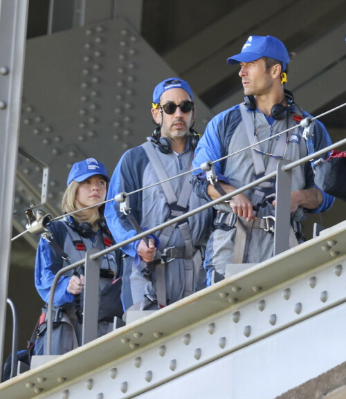 Euphoria Star Sydney Sweeney Spends Easter Holiday Climbing Sydney Harbour Bridge

Sydney Sweeney is currently shooting a new romantic comedy in Australia.

On Easter Sunday, the actress spent her day off climbing the Sydney Harbor Bridge alongside her co-star, Glen Powell, 34.

The Euphoria star shone as she took in the breathtaking view from far above the city.

The 25-year-old was decked out in a climbing suit in shades of gray and blue and a safety harness.

She completed her look with a baby cap and minimal make-up for the strenuous climb.

Sydney Sweeney is currently shooting a new romantic comedy in Australia

On Easter Sunday, the actress spent her day off climbing the Sydney Harbor Bridge alongside her co-star, Glen Powell

The Euphoria star shone as she took in the breathtaking view from far above the city

The beauty had her blonde locks around her face and a pair of headphones around her neck.

Glen opted for the same ensemble, with a classic climbing suit and matching blue cap.

Last month, the two took a break from filming to visit the Taronga Zoo together and feed giraffes.

Sydney has been Down Under for several weeks now and last week visited another popular tourist spot – Luna Park.

A guide led the actress up the many steps to the top of the bridge

She has filmed in locations around the city, including the inner-city suburb of Surry Hills and Double Bay, in the east of the city.

The yet-to-be-titled romantic comedy is directed by Will Gluck, who helmed the romantic comedies Easy A and Friends With Benefits.

Details about the plot of the R-rated movie are being kept under wraps, but the movie will also star Bryan Brown, Michelle Hurd, Hadley Robinson, and Darren Barnet.

The project is expected to bring in AUD$41 million to the local New South Wales economy and create more than 440 jobs for cast and crew.

Details about the plot of the R-rated movie are being kept under wraps, but the movie will also star Bryan Brown, Michelle Hurd, Hadley Robinson and Darren Barnet

The actress is best known for starring in The White Lotus and playing Cassie Howard on the HBO hit show Euphoria.

Sydney is engaged to Jonathan Davino, 37, a millionaire restaurant owner. The couple confirmed their engagement to People in March last year.

Sweeney and her fiancé were first spotted in each other’s company in 2018.

The actress made a rare statement about her love life during an interview with Cosmopolitan last year, saying she wasn’t romantically interested in anyone who works in the entertainment industry.

Maverick star Glen was spotted picking up his gorgeous model girlfriend Gigi Paris from the airport in Australia last month, while Gigi came to visit him on location

“I don’t date people who are in the spotlight. I don’t date actors or musicians or anyone in the entertainment business because that way I can just be normal Syd and it’s easiest. I have a great support system,” she said.

The artist did speak about the qualities she was looking for in a partner.

‘I’m looking for a best friend. I need to be able to be with someone who I can hang out with literally 24/7 and who I never tire of and who we laugh about every day,” she said.

Maverick star Glen was spotted last month picking up his gorgeous model girlfriend Gigi Paris from the airport in Australia, while Gigi came to visit him on location.