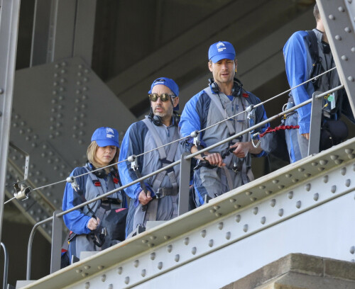 Euphoria Star Sydney Sweeney Spends Easter Holiday Climbing Sydney Harbour Bridge

Sydney Sweeney is currently shooting a new romantic comedy in Australia.

On Easter Sunday, the actress spent her day off climbing the Sydney Harbor Bridge alongside her co-star, Glen Powell, 34.

The Euphoria star shone as she took in the breathtaking view from far above the city.

The 25-year-old was decked out in a climbing suit in shades of gray and blue and a safety harness.

She completed her look with a baby cap and minimal make-up for the strenuous climb.

Sydney Sweeney is currently shooting a new romantic comedy in Australia

On Easter Sunday, the actress spent her day off climbing the Sydney Harbor Bridge alongside her co-star, Glen Powell

The Euphoria star shone as she took in the breathtaking view from far above the city

The beauty had her blonde locks around her face and a pair of headphones around her neck.

Glen opted for the same ensemble, with a classic climbing suit and matching blue cap.

Last month, the two took a break from filming to visit the Taronga Zoo together and feed giraffes.

Sydney has been Down Under for several weeks now and last week visited another popular tourist spot – Luna Park.

A guide led the actress up the many steps to the top of the bridge

She has filmed in locations around the city, including the inner-city suburb of Surry Hills and Double Bay, in the east of the city.

The yet-to-be-titled romantic comedy is directed by Will Gluck, who helmed the romantic comedies Easy A and Friends With Benefits.

Details about the plot of the R-rated movie are being kept under wraps, but the movie will also star Bryan Brown, Michelle Hurd, Hadley Robinson, and Darren Barnet.

The project is expected to bring in AUD$41 million to the local New South Wales economy and create more than 440 jobs for cast and crew.

Details about the plot of the R-rated movie are being kept under wraps, but the movie will also star Bryan Brown, Michelle Hurd, Hadley Robinson and Darren Barnet

The actress is best known for starring in The White Lotus and playing Cassie Howard on the HBO hit show Euphoria.

Sydney is engaged to Jonathan Davino, 37, a millionaire restaurant owner. The couple confirmed their engagement to People in March last year.

Sweeney and her fiancé were first spotted in each other’s company in 2018.

The actress made a rare statement about her love life during an interview with Cosmopolitan last year, saying she wasn’t romantically interested in anyone who works in the entertainment industry.

Maverick star Glen was spotted picking up his gorgeous model girlfriend Gigi Paris from the airport in Australia last month, while Gigi came to visit him on location

“I don’t date people who are in the spotlight. I don’t date actors or musicians or anyone in the entertainment business because that way I can just be normal Syd and it’s easiest. I have a great support system,” she said.

The artist did speak about the qualities she was looking for in a partner.

‘I’m looking for a best friend. I need to be able to be with someone who I can hang out with literally 24/7 and who I never tire of and who we laugh about every day,” she said.

Maverick star Glen was spotted last month picking up his gorgeous model girlfriend Gigi Paris from the airport in Australia, while Gigi came to visit him on location.