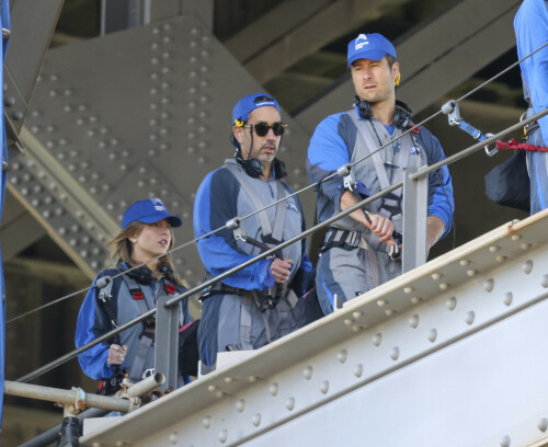 Euphoria Star Sydney Sweeney Spends Easter Holiday Climbing Sydney Harbour Bridge

Sydney Sweeney is currently shooting a new romantic comedy in Australia.

On Easter Sunday, the actress spent her day off climbing the Sydney Harbor Bridge alongside her co-star, Glen Powell, 34.

The Euphoria star shone as she took in the breathtaking view from far above the city.

The 25-year-old was decked out in a climbing suit in shades of gray and blue and a safety harness.

She completed her look with a baby cap and minimal make-up for the strenuous climb.

Sydney Sweeney is currently shooting a new romantic comedy in Australia

On Easter Sunday, the actress spent her day off climbing the Sydney Harbor Bridge alongside her co-star, Glen Powell

The Euphoria star shone as she took in the breathtaking view from far above the city

The beauty had her blonde locks around her face and a pair of headphones around her neck.

Glen opted for the same ensemble, with a classic climbing suit and matching blue cap.

Last month, the two took a break from filming to visit the Taronga Zoo together and feed giraffes.

Sydney has been Down Under for several weeks now and last week visited another popular tourist spot – Luna Park.

A guide led the actress up the many steps to the top of the bridge

She has filmed in locations around the city, including the inner-city suburb of Surry Hills and Double Bay, in the east of the city.

The yet-to-be-titled romantic comedy is directed by Will Gluck, who helmed the romantic comedies Easy A and Friends With Benefits.

Details about the plot of the R-rated movie are being kept under wraps, but the movie will also star Bryan Brown, Michelle Hurd, Hadley Robinson, and Darren Barnet.

The project is expected to bring in AUD$41 million to the local New South Wales economy and create more than 440 jobs for cast and crew.

Details about the plot of the R-rated movie are being kept under wraps, but the movie will also star Bryan Brown, Michelle Hurd, Hadley Robinson and Darren Barnet

The actress is best known for starring in The White Lotus and playing Cassie Howard on the HBO hit show Euphoria.

Sydney is engaged to Jonathan Davino, 37, a millionaire restaurant owner. The couple confirmed their engagement to People in March last year.

Sweeney and her fiancé were first spotted in each other’s company in 2018.

The actress made a rare statement about her love life during an interview with Cosmopolitan last year, saying she wasn’t romantically interested in anyone who works in the entertainment industry.

Maverick star Glen was spotted picking up his gorgeous model girlfriend Gigi Paris from the airport in Australia last month, while Gigi came to visit him on location

“I don’t date people who are in the spotlight. I don’t date actors or musicians or anyone in the entertainment business because that way I can just be normal Syd and it’s easiest. I have a great support system,” she said.

The artist did speak about the qualities she was looking for in a partner.

‘I’m looking for a best friend. I need to be able to be with someone who I can hang out with literally 24/7 and who I never tire of and who we laugh about every day,” she said.

Maverick star Glen was spotted last month picking up his gorgeous model girlfriend Gigi Paris from the airport in Australia, while Gigi came to visit him on location.