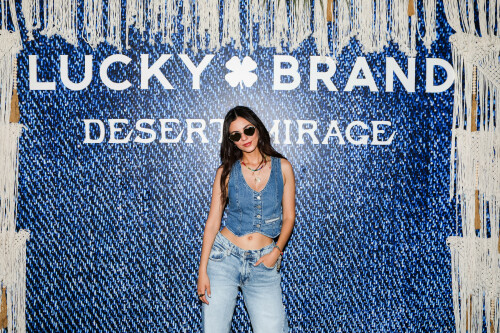 Victoria Justice At The Lucky Brand Desert Mirage, Palm Springs, USA - April 15 2023

Her Style: Lucky Brand Lucky Legend Indigo Denim Vest + Lucky Brand Low Rise Super Wide Leg + Lucky Brand Curla Crochet High Top Sneaker