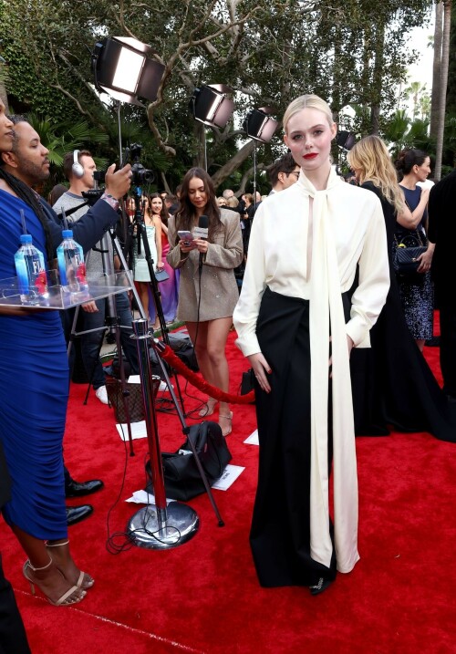 Elle Fanning attends at The Daily Front Row's Seventh Annual Fashion LA Awards in Beverly Hills - April 23, 2023

Elle Fanning Wore Givenchy To The Daily Front Row’s 7th Annual Fashion Los Angeles Awards

Elle Fanning attended the Daily Front Row’s 7th Annual Fashion Los Angeles Awards on Sunday (April 23) in Beverly Hills, California, as a guest presenter.

‘The Great’ actress wore a Givenchy Fall 2023 look.

The romantic notion created by the pale-yellow silk satin blouse which makes the look so quintessentially elegant.

When it comes to the low-waist maxi skirt, it looked good in some pictures, and too long in others which depended on her pose.

Crisp, clean, minimalist, and elegant. It looks like Elle is fully embarking on a new style chapter.

#ElleFanning