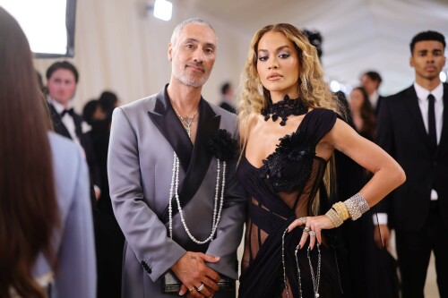 Rita Ora Makes a Case for Sheer on Met Gala Red Carpet 2023 in Prabal Gurung Dress & Strappy Sandals With Taika Waititi

Rita Ora arrived at the 2023 Met Gala in New York wearing an all-black ensemble. The singer posed on the carpet with her husband, director Taika Waititi.

Ora donned a daring outfit that featured detailed draping, striking cutouts and well-defined boning from Prabal Gurung.

The Nepalese-American fashion designer has been a fixture at the Met Gala since 2010. His designs have graced the red carpet, showcasing his signature style that often combines traditional Nepalese influences with modern, edgy elements. He has dressed a range of celebrities, from Sarah Jessica Parker to Zendaya over the years.

Regarding her footwear choice, Ora strapped on a pair of strappy sandals with a generous platform. These strappy platform sandals feature a chic ankle buckle closure that provides a secure fit. The almond toe design adds a touch of elegance, while the 6-inch heel elongates the legs and creates a flattering silhouette.

Ora’s fashion style is a mix of edgy and glamorous, often pushing boundaries with bold statement pieces. She is known for wearing daring outfits that showcase her confident and daring personality. Rita has also been a standout at the Met Gala, consistently impressing with her unique and avant-garde choices. From her bold silver feathered gown in 2016 to her Prada moment in 2021, she always manages to turn heads on the red carpet.

The Met Gala raises funds for the Metropolitan Museum of Art in New York City and celebrates the Costume Institute’s annual exhibits. This year’s theme, “Karl Lagerfeld: A Line of Beauty,” celebrates the life and career of designer Karl Lagerfeld. The 2023 event is notably co-chaired by Dua Lipa, Roger Federer, Michaela Coel, Penelope Cruz and Vogue editor-in-chief Anna Wintour.

Rita Ora attends The 2023 Met Gala Celebrating "Karl Lagerfeld: A Line Of Beauty" at The Metropolitan Museum of Art on May 01, 2023 in New York City.

Met Gala 2023: Rita Ora sizzles in a black sheer gown as she joins dapper husband Taika Waititi on the star-studded red carpet.

Rita Ora brought the goth glamour to the Met Gala 2023 red carpet with a sheer corseted gown by Prabal Gurung.

#RitaOra #2023MetGala