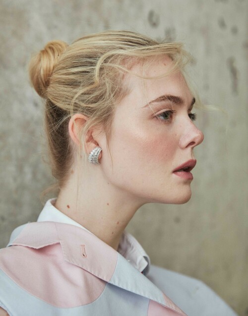 Elle Fanning Photoshoot for Flaunt Magazine 186: The Pomenade Issue, April 2023

Details: THOM BROWNE vest, shirt, and CARTIER earrings, bracelet, watch, and rings.

Elle Fanning Covers The New Issue Of FLAUNT Magazine

Elle Fanning is on the cover of the new issue of FLAUNT magazine. The young actress is on the cover to promote the latest season of her hit comedy series, The Great. Highlights from her interview are below.

On how her and her character, Catherine, have become intertwined: “I have been reflecting a lot on Catherine and myself and how our lives have intertwined. We did the pilot when I was 20 and now, I’m about to turn 25. I’ve been on this show during the most formative years of my life and Catherine has become imprinted on my soul. I wonder if it’s her who’s helped me, or is it me who has just put so much of myself into her? I’m not sure. The lines are starting to blur a lot with the both of us. But it is the most special part I’ve ever had.”

On the production company she started with her sister, Dakota: “I worked with this actor, I won’t say who, but he’s very established. But he said he’d never worked with a female director before,. And I was like ‘What?!’ It was so surprising to me. With our company [Lewellen Pictures] we try to have female writers and directors to tell any story—not just female-driven ones, although of course they’re a focus… but just because you’re a female director doesn’t mean that you have to tell a female-driven story.”

The new season of The Great drops on Hulu on May 12.

#ElleFanning