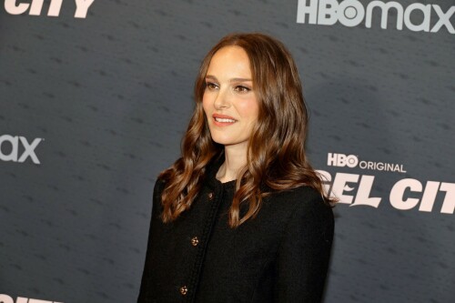 Natalie Portman - HBO Documentary Films' Series 'Angel City' Premiere in West Hollywood - May 4, 2023

Natalie attended HBO Documentary Films’ Series “Angel City” Los Angeles Premiere at Pacific Design Center in West Hollywood, California on May 4, 2023. Kara Nortman and Julie Uhrman, the co-founders of the team and the vast majority of the players also walked the red carpet with her.

Natalie Portman Walks Pink Carpet for Angel City Premiere

On Thursday, May 4, 2023, HBO hosted the red carpet premiere for the highly anticipated documentary series, ANGEL CITY, at the Pacific Design Center in Los Angeles. Executive producer and Angel City Co-Founder Natalie Portman attended, along with director Arlene Nelson, executive producers Elizabeth Chai Vasarhelyi, Christine O’Malley, Anna Barnes, Sophie Mas, and co-producer Michaela Celella.

Angel City Football Club attendees included Angel City FC Co-Founder and President Julie Uhrman, Co-Founder Kara Nortman, Angel City FC star players Christen Press, Sydney Leroux, and Simone Charley, Angel City FC manager Freya Coombe, National Women’s Soccer League Commissioner Jessica Berman, Angel City investors and former US Women’s National Team players Angela Hucles, Shannon MacMillan, and Ronnie Fair Sullins, Angel City investor and former US Men’s National Team player Cobi Jones and Los Angeles Sparks player Jordin Canada.

Angel City is a gripping docuseries that goes behind the scenes and onto the pitch of the groundbreaking Los Angeles-based professional National Women’s Soccer League team, Angel City Football Club. Pulling back the curtain on the origin story through the 2022 inaugural season of the female-founded and led team, the series reveals the passion and grit needed to build a franchise from scratch and blaze a bold trail in the world of professional sports.

Natalie Portman Is a Miu Miu Girl in Tiny Shorts & Peep-Toe Heels at ‘Angel City’ LA Premiere

Natalie Portman gave power dressing an edgy upgrade for the premiere of the “Angel City” documentary in West Hollywood, Calif., on Thursday. The Academy Award-winning actress is one of the directors of the new HBO docuseries, which takes a deep dive into the origins of the professional women’s soccer team, Angel City FC.

Portman put her own personal spin on monochromatic style for the occasion. The “Thor: Love and Thunder” star arrived at the Pacific Design Center in a full ensemble by Miu Miu.

Portman’s outfit included a black jacket and matching tiny boy shorts. Both pieces were decorated with gold buttons and had square pockets at the front.

Sticking to a minimalistic style moment, Portman opted for minimal accessories. As for glam, the entertainer went with soft makeup and styled her hair in loose waves.

Giving the outfit a literal boost, the “Black Swan” actress completed her look with a pair of peep-toe platform pumps. The silhouette featured a large bow across the toe, a thick strap at the back and sat atop a thin stiletto heel.

When it comes to fashion, Portman has a stylish yet refined aesthetic. The Golden Globe winner tends to gravitate towards creations from labels like Mugler Haute Couture, Givenchy and even Gucci for red-carpet events and appearances.

“Angel City” is a gripping docuseries that goes behind the scenes and onto the pitch of the groundbreaking Los Angeles-based professional women’s soccer team, Angel City Football Club. Pulling back the curtain on the origin story through the 2022 inaugural season of the female-founded and led team, the series reveals the passion and grit needed to build a franchise from scratch and blaze a bold trail in the world of professional sports. The three-part HBO original documentary was directed by Arlene Nelson and executive produced by Academy Award-winners Natalie Portman, Elizabeth Chai Vasarhelyi and Jimmy Chin, with Sophie Mas, Anna Barnes and Christine O’Malley.

#NataliePortman