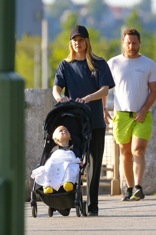 Jennifer Lawrence goes casual as she takes son Cy out for a walk after wearing flip flops at Cannes

Jennifer Lawrence goes casual as she takes son Cy out for a walk in NYC… after she made a splash by wearing flip flops with her red gown at Cannes

Jennifer Lawrence is back in mom mode after her glamorous moment at the Cannes Film Festival.

The Hunger Games star, 32, was spotted back in New York City on Saturday morning as she spent some quality time with her son Cy, one.

She cut a casual figure in a pair of loose black cotton pants and a baggy blue T-shirt as she pushed the little boy in his stroller on a walk.

The actress covered up her long blond hair with a black ball cap, and she wore classic black Adidas trainers.

Jennifer, who shares Cy with her husband Cooke Maroney, wore air pods in her ears as she pushed the stroller her adorable toddler.

Mom mode: Jennifer Lawrence is back in mom mode after her glamorous moment at the Cannes Film Festival. She took a walk in NYC with her son Cy, one, on Saturday

Her outing comes after she stunned at Cannes in a red gown with very unusual footwear.

The Silver Linings Playbook actress was at Cannes for the premiere of the film Anatomy of a Fall.

She looked gorgeous in a long red gown featuring an A-line skirt and a long train with a surprising twist — she wore black flip flops.

The unconventional pairing of a high fashion gown and simple flip flops surprised fans but it really shouldn’t have as the Don’t Look Up actress has a history of tripping and falling.

In fact, her Hunger Games costar Liam Hemsworth hilariously said: ‘She’s terrible at walking. I am constantly surprised by how much she falls down without trying at all,’ during a 2015 appearance on Late Night with Seth Meyers.

The Red Sparrow actress famously tripped and fell at the Oscars in 2013 as she was walking up the steps to accept her Academy Award for Best Actress.

The following year she tripped and fell while walking the red carpet at an event.

Two years later she tripped and lost a shoe as she left a dinner in celebration of her film Silver Linings Playbook in London.

The comfy footwear ensured the No Hard Feelings star wouldn’t face plant at the glamorous event.

Walk: She cut a casual figure in a pair of loose black cotton pants and a baggy blue T-shirt. The Hunger Games star, 32, put a black ball cap on over her long blonde hair

In the upcoming film, Jennifer plays Maddie, a bartender and wanna be Uber delivery driver ‘desperate for cash’ who ‘accepts a Craigslist ad from a couple seeking someone to date their painfully awkward teenage son,’ according to the IMDB synopsis.

Maddie helps the teen Percy (Andrew Barth Feldman) unleash his wild side, introducing him to alcohol, partying, making crude jokes and quipping about sex dolls.

The film marks a return to comedy for the Oscar winner, who has been playing more dramatic roles lately.

No Hard Feelings hits theaters on June 23.

uk-times.com

#JenniferLawrence