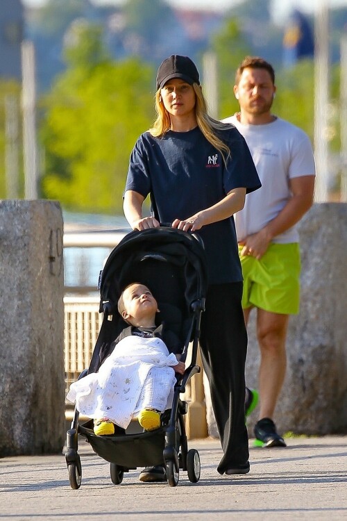 Jennifer Lawrence goes casual as she takes son Cy out for a walk after wearing flip flops at Cannes

Jennifer Lawrence goes casual as she takes son Cy out for a walk in NYC… after she made a splash by wearing flip flops with her red gown at Cannes

Jennifer Lawrence is back in mom mode after her glamorous moment at the Cannes Film Festival.

The Hunger Games star, 32, was spotted back in New York City on Saturday morning as she spent some quality time with her son Cy, one.

She cut a casual figure in a pair of loose black cotton pants and a baggy blue T-shirt as she pushed the little boy in his stroller on a walk.

The actress covered up her long blond hair with a black ball cap, and she wore classic black Adidas trainers.

Jennifer, who shares Cy with her husband Cooke Maroney, wore air pods in her ears as she pushed the stroller her adorable toddler.

Mom mode: Jennifer Lawrence is back in mom mode after her glamorous moment at the Cannes Film Festival. She took a walk in NYC with her son Cy, one, on Saturday

Her outing comes after she stunned at Cannes in a red gown with very unusual footwear.

The Silver Linings Playbook actress was at Cannes for the premiere of the film Anatomy of a Fall.

She looked gorgeous in a long red gown featuring an A-line skirt and a long train with a surprising twist — she wore black flip flops.

The unconventional pairing of a high fashion gown and simple flip flops surprised fans but it really shouldn’t have as the Don’t Look Up actress has a history of tripping and falling.

In fact, her Hunger Games costar Liam Hemsworth hilariously said: ‘She’s terrible at walking. I am constantly surprised by how much she falls down without trying at all,’ during a 2015 appearance on Late Night with Seth Meyers.

The Red Sparrow actress famously tripped and fell at the Oscars in 2013 as she was walking up the steps to accept her Academy Award for Best Actress.

The following year she tripped and fell while walking the red carpet at an event.

Two years later she tripped and lost a shoe as she left a dinner in celebration of her film Silver Linings Playbook in London.

The comfy footwear ensured the No Hard Feelings star wouldn’t face plant at the glamorous event.

Walk: She cut a casual figure in a pair of loose black cotton pants and a baggy blue T-shirt. The Hunger Games star, 32, put a black ball cap on over her long blonde hair

In the upcoming film, Jennifer plays Maddie, a bartender and wanna be Uber delivery driver ‘desperate for cash’ who ‘accepts a Craigslist ad from a couple seeking someone to date their painfully awkward teenage son,’ according to the IMDB synopsis.

Maddie helps the teen Percy (Andrew Barth Feldman) unleash his wild side, introducing him to alcohol, partying, making crude jokes and quipping about sex dolls.

The film marks a return to comedy for the Oscar winner, who has been playing more dramatic roles lately.

No Hard Feelings hits theaters on June 23.

uk-times.com

#JenniferLawrence