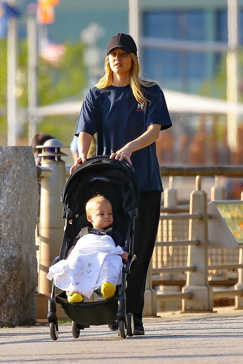 Jennifer Lawrence goes casual as she takes son Cy out for a walk after wearing flip flops at Cannes

Jennifer Lawrence goes casual as she takes son Cy out for a walk in NYC… after she made a splash by wearing flip flops with her red gown at Cannes

Jennifer Lawrence is back in mom mode after her glamorous moment at the Cannes Film Festival.

The Hunger Games star, 32, was spotted back in New York City on Saturday morning as she spent some quality time with her son Cy, one.

She cut a casual figure in a pair of loose black cotton pants and a baggy blue T-shirt as she pushed the little boy in his stroller on a walk.

The actress covered up her long blond hair with a black ball cap, and she wore classic black Adidas trainers.

Jennifer, who shares Cy with her husband Cooke Maroney, wore air pods in her ears as she pushed the stroller her adorable toddler.

Mom mode: Jennifer Lawrence is back in mom mode after her glamorous moment at the Cannes Film Festival. She took a walk in NYC with her son Cy, one, on Saturday

Her outing comes after she stunned at Cannes in a red gown with very unusual footwear.

The Silver Linings Playbook actress was at Cannes for the premiere of the film Anatomy of a Fall.

She looked gorgeous in a long red gown featuring an A-line skirt and a long train with a surprising twist — she wore black flip flops.

The unconventional pairing of a high fashion gown and simple flip flops surprised fans but it really shouldn’t have as the Don’t Look Up actress has a history of tripping and falling.

In fact, her Hunger Games costar Liam Hemsworth hilariously said: ‘She’s terrible at walking. I am constantly surprised by how much she falls down without trying at all,’ during a 2015 appearance on Late Night with Seth Meyers.

The Red Sparrow actress famously tripped and fell at the Oscars in 2013 as she was walking up the steps to accept her Academy Award for Best Actress.

The following year she tripped and fell while walking the red carpet at an event.

Two years later she tripped and lost a shoe as she left a dinner in celebration of her film Silver Linings Playbook in London.

The comfy footwear ensured the No Hard Feelings star wouldn’t face plant at the glamorous event.

Walk: She cut a casual figure in a pair of loose black cotton pants and a baggy blue T-shirt. The Hunger Games star, 32, put a black ball cap on over her long blonde hair

In the upcoming film, Jennifer plays Maddie, a bartender and wanna be Uber delivery driver ‘desperate for cash’ who ‘accepts a Craigslist ad from a couple seeking someone to date their painfully awkward teenage son,’ according to the IMDB synopsis.

Maddie helps the teen Percy (Andrew Barth Feldman) unleash his wild side, introducing him to alcohol, partying, making crude jokes and quipping about sex dolls.

The film marks a return to comedy for the Oscar winner, who has been playing more dramatic roles lately.

No Hard Feelings hits theaters on June 23.

uk-times.com

#JenniferLawrence