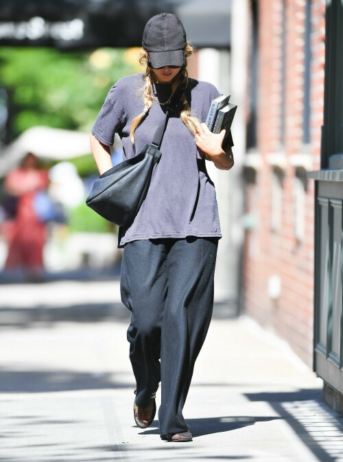 Jennifer Lawrence goes casual as she takes son Cy out for a walk after wearing flip flops at Cannes

Jennifer Lawrence goes casual as she takes son Cy out for a walk in NYC… after she made a splash by wearing flip flops with her red gown at Cannes

Jennifer Lawrence is back in mom mode after her glamorous moment at the Cannes Film Festival.

The Hunger Games star, 32, was spotted back in New York City on Saturday morning as she spent some quality time with her son Cy, one.

She cut a casual figure in a pair of loose black cotton pants and a baggy blue T-shirt as she pushed the little boy in his stroller on a walk.

The actress covered up her long blond hair with a black ball cap, and she wore classic black Adidas trainers.

Jennifer, who shares Cy with her husband Cooke Maroney, wore air pods in her ears as she pushed the stroller her adorable toddler.

Mom mode: Jennifer Lawrence is back in mom mode after her glamorous moment at the Cannes Film Festival. She took a walk in NYC with her son Cy, one, on Saturday

Her outing comes after she stunned at Cannes in a red gown with very unusual footwear.

The Silver Linings Playbook actress was at Cannes for the premiere of the film Anatomy of a Fall.

She looked gorgeous in a long red gown featuring an A-line skirt and a long train with a surprising twist — she wore black flip flops.

The unconventional pairing of a high fashion gown and simple flip flops surprised fans but it really shouldn’t have as the Don’t Look Up actress has a history of tripping and falling.

In fact, her Hunger Games costar Liam Hemsworth hilariously said: ‘She’s terrible at walking. I am constantly surprised by how much she falls down without trying at all,’ during a 2015 appearance on Late Night with Seth Meyers.

The Red Sparrow actress famously tripped and fell at the Oscars in 2013 as she was walking up the steps to accept her Academy Award for Best Actress.

The following year she tripped and fell while walking the red carpet at an event.

Two years later she tripped and lost a shoe as she left a dinner in celebration of her film Silver Linings Playbook in London.

The comfy footwear ensured the No Hard Feelings star wouldn’t face plant at the glamorous event.

Walk: She cut a casual figure in a pair of loose black cotton pants and a baggy blue T-shirt. The Hunger Games star, 32, put a black ball cap on over her long blonde hair

In the upcoming film, Jennifer plays Maddie, a bartender and wanna be Uber delivery driver ‘desperate for cash’ who ‘accepts a Craigslist ad from a couple seeking someone to date their painfully awkward teenage son,’ according to the IMDB synopsis.

Maddie helps the teen Percy (Andrew Barth Feldman) unleash his wild side, introducing him to alcohol, partying, making crude jokes and quipping about sex dolls.

The film marks a return to comedy for the Oscar winner, who has been playing more dramatic roles lately.

No Hard Feelings hits theaters on June 23.

uk-times.com

#JenniferLawrence