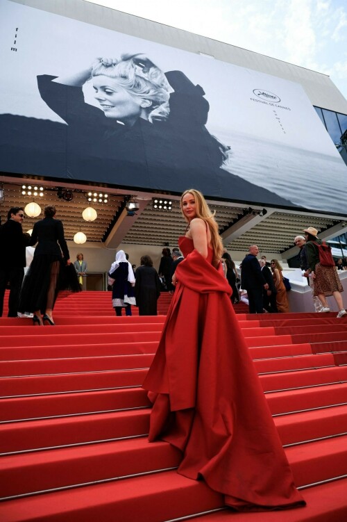 Jennifer Lawrence swaps her heels for flip-flops on the Cannes red carpet

Putting comfort first

Just one week in, and this year's Cannes Film Festival red carpet has already provided us with plenty of glamorous celebrity style – with the likes of Natalie Portman, Alicia Vikander and Gigi Hadid impressing in their couture gowns and high jewellery.

It was Jennifer Lawrence's turn to walk the red carpet yesterday, and she did so in particularly relatable fashion. The actress attended the premiere of French thriller Anatomie D'une Chute (Anatomy Of A Fall), wearing a beautiful custom red crepe silk Dior couture gown, which featured a ruched bodice, matching stole and full layered skirt – but it was her footwear that proved particularly interesting. Lawrence initially walked the red carpet in a pair of co-ordinating red heels, but later swapped them for a pair of flat black flip-flops.

The comfortable shoes could be seen peeking out from below her dress as she descended those famous red steps.

It's a particularly notable move, given the strict dress code that the Cannes Film Festival has become renowned for. For years, festival organisers imposed a controversial 'no flat shoes' rule, insisting that women must wear heels on the red carpet – with reports that they turned a group of women away in 2015. Understandably, many stars have since flouted the outdated rule – with some opting to go without shoes altogether.

In 2018, Kristen Stewart famously kicked off her black high Christian Louboutin stilettos at the screening of Blackkklansman, instead walking the red carpet completely barefoot. At the time, the actress said: "I feel like you can’t ask people that any more. If you’re not asking guys to wear heels and a dress, you cannot ask me either.... I get the black-tie thing but you should be able to do either version — flats or heels."

Julia Roberts also made a memorable barefoot appearance on the Cannes red-carpet for the premiere of Money Monster in 2016, removing her heels midway through.

"A lot was happening from my ankles up," she told Australia’s Sunrise channel afterwards. "Let’s not forget all that. A lot of time and effort went into ankles up. I just want to say for the record … I looked nice last night!"

Emily Blunt also chimed in with her disapproval at the antiquated dress code. "Everyone should wear flats, to be honest. We shouldn’t wear high heels," she said back in 2016. "That’s very disappointing, just when you kind of think there are these new waves of equality."

harpersbazaar.com

#JenniferLawrence