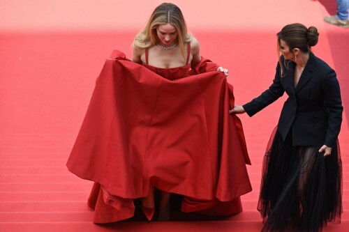 Jennifer Lawrence swaps her heels for flip-flops on the Cannes red carpet

Putting comfort first

Just one week in, and this year's Cannes Film Festival red carpet has already provided us with plenty of glamorous celebrity style – with the likes of Natalie Portman, Alicia Vikander and Gigi Hadid impressing in their couture gowns and high jewellery.

It was Jennifer Lawrence's turn to walk the red carpet yesterday, and she did so in particularly relatable fashion. The actress attended the premiere of French thriller Anatomie D'une Chute (Anatomy Of A Fall), wearing a beautiful custom red crepe silk Dior couture gown, which featured a ruched bodice, matching stole and full layered skirt – but it was her footwear that proved particularly interesting. Lawrence initially walked the red carpet in a pair of co-ordinating red heels, but later swapped them for a pair of flat black flip-flops.

The comfortable shoes could be seen peeking out from below her dress as she descended those famous red steps.

It's a particularly notable move, given the strict dress code that the Cannes Film Festival has become renowned for. For years, festival organisers imposed a controversial 'no flat shoes' rule, insisting that women must wear heels on the red carpet – with reports that they turned a group of women away in 2015. Understandably, many stars have since flouted the outdated rule – with some opting to go without shoes altogether.

In 2018, Kristen Stewart famously kicked off her black high Christian Louboutin stilettos at the screening of Blackkklansman, instead walking the red carpet completely barefoot. At the time, the actress said: "I feel like you can’t ask people that any more. If you’re not asking guys to wear heels and a dress, you cannot ask me either.... I get the black-tie thing but you should be able to do either version — flats or heels."

Julia Roberts also made a memorable barefoot appearance on the Cannes red-carpet for the premiere of Money Monster in 2016, removing her heels midway through.

"A lot was happening from my ankles up," she told Australia’s Sunrise channel afterwards. "Let’s not forget all that. A lot of time and effort went into ankles up. I just want to say for the record … I looked nice last night!"

Emily Blunt also chimed in with her disapproval at the antiquated dress code. "Everyone should wear flats, to be honest. We shouldn’t wear high heels," she said back in 2016. "That’s very disappointing, just when you kind of think there are these new waves of equality."

harpersbazaar.com

#JenniferLawrence